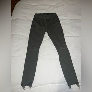 Green lucky skinny jeans with rips